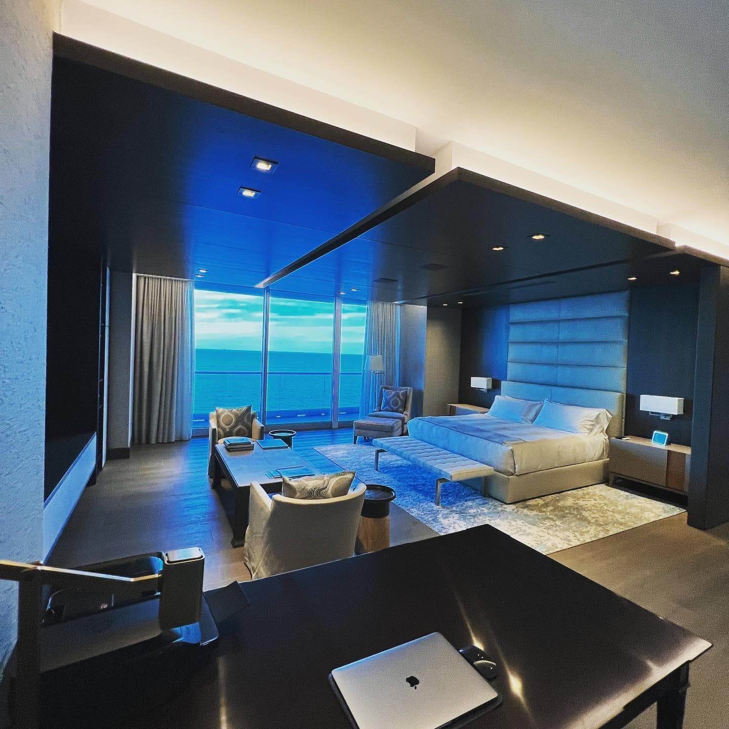 Blue bedroom with ocean view